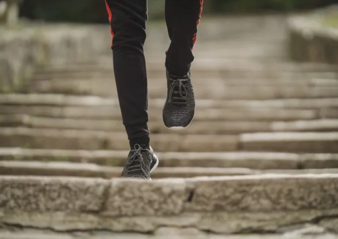 Athlete running up steps during a return-to-sport testing session
